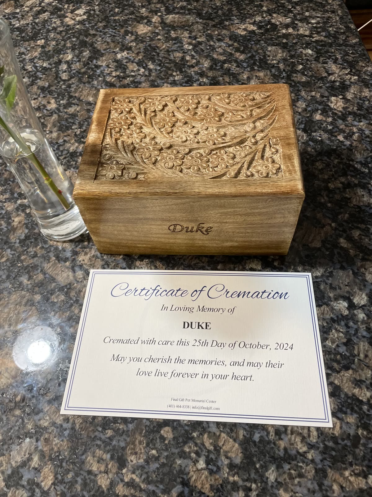 Duke’s engraved urn and Certificate of Cremation, dated October 25, 2024.